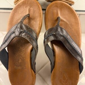 OluKai Brown and Black Leather Sandals